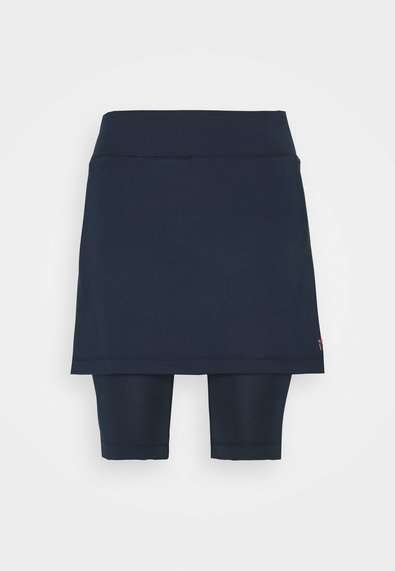 Skort de deporte en color marino que cuenta con un short interior ajustado y una capa exterior suelta. Fabricado con un material elástico, de textura suave y costuras limpias.