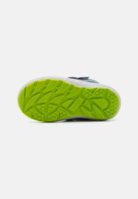 Superfit GROOVY 2.0 UNISEX - Botas para la nieve - blau/hellgrün