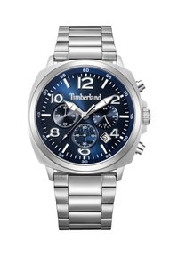 Reloj de acero inoxidable con esfera azul, grandes números, tres subesferas y correa plateada. Cuenta con una ventana de fecha cerca de la posición de las 4 en punto.