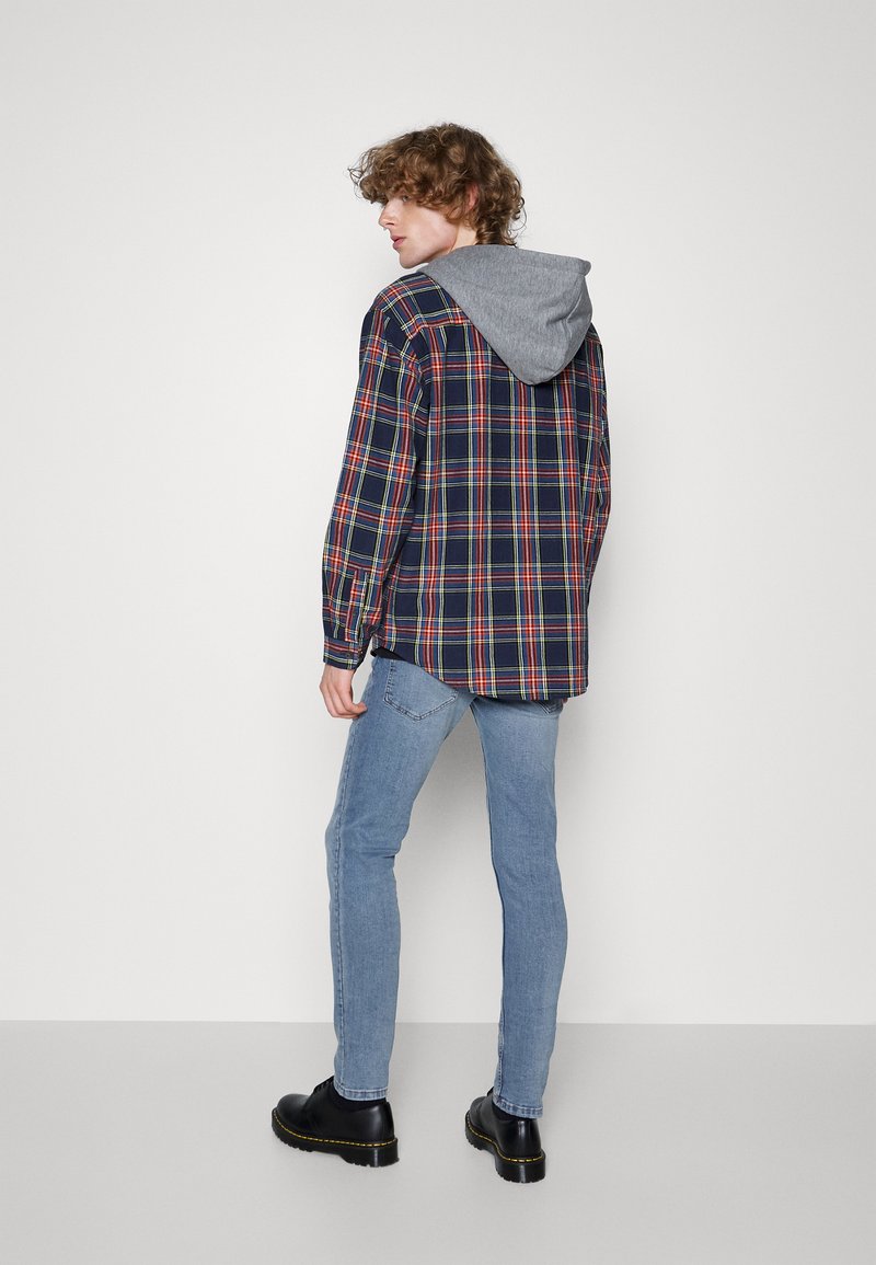 Redefined Rebel STOCKHOLM DESTROY Slim fit jeans calabria