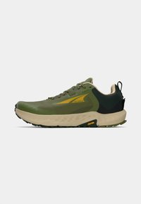 Green running shoe with a mesh upper, yellow accents, beige midsole, and a black heel counter. Features a textured outsole for grip.