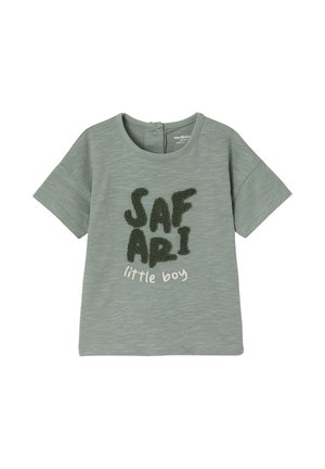 Green toddler t-shirt with short sleeves, button closure at back, and textured "SAFARI little boy" text on front.
