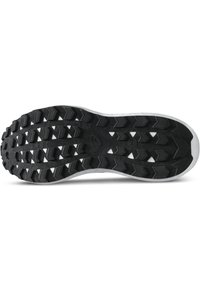 Black rubber shoe sole featuring a textured pattern with large, angular lugs for traction and a white edge along the perimeter.