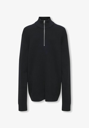 Donker marineblauwe gebreide trui met hoge kraag en rits aan de voorkant. Heeft lange mouwen en een geribbelde structuur, met aansluitende boorden en zoom.