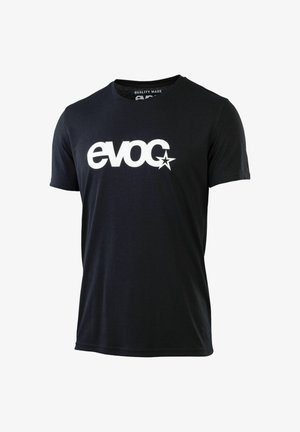 Black cotton t-shirt with short sleeves and a round neckline. The front features a large white logo that reads "evoc" with a star accent.