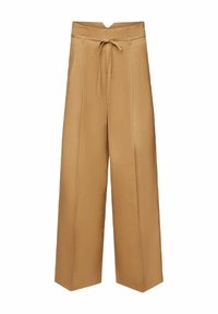 Beige wide-leg trousers made from textured fabric, featuring a high waist with a tied belt and two front pockets for added utility.