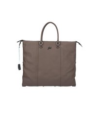 Sac fourre-tout en cuir marron avec fermeture éclair, deux poignées supérieures et détails en métal circulaires. Présente un logo discret à l'avant.