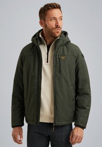 Hooded green jacket with a zip closure, featuring side pockets, a chest pocket, and a contrasting beige inner lining. Smooth texture.