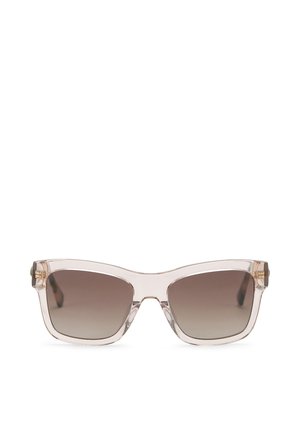 Heldere, oversized zonnebril met een geometrisch montuur. Verloopbrilglazen in bruin met lichtbruine transparante kunststof. Goudkleurige accenten bij de pootjes.