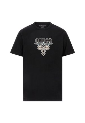 Black cotton t-shirt featuring embroidered "GUESS" logo and geometric patterns in light blue and beige, round neckline, short sleeves.