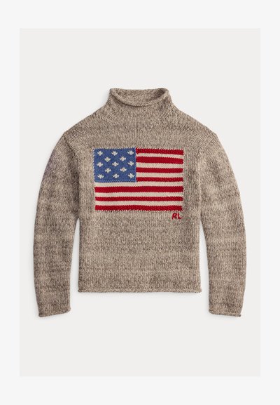 Bežový rolák s pleteným dizajnom americkej vlajky v modrej a červenej farbe. Obsahuje rebrovaný golier a textúrovanú tkaninu.