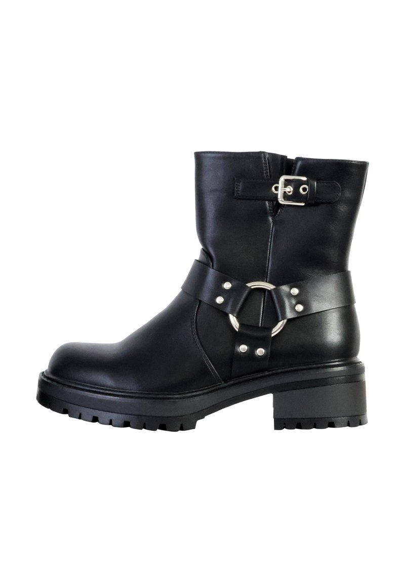 Black leather ankle boot with a round toe, chunky heel, decorative buckle, and strap with metal hardware detailing. Rubber sole for traction.