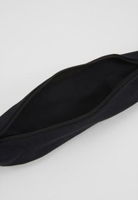 ASICS WAISTPACK - Gürteltasche - performance black