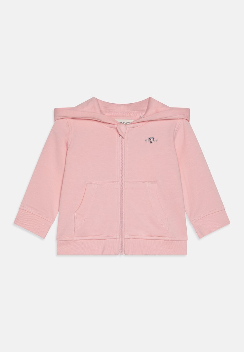 Felpa rosa con zip realizzata in morbido cotone, dotata di cappuccio, due tasche frontali e polsini a coste. Piccolo logo ricamato sul petto.