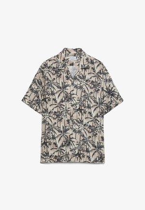 Chemise beige à manches courtes avec boutons, imprimé palmiers noirs et col camp, posée à plat sur fond blanc.