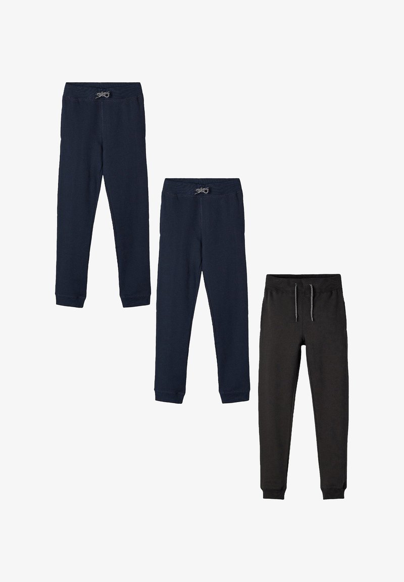 Three pairs of jogger pants: two in navy with elastic waistbands and cuffs, one in black with adjustable drawstring and cuffs.