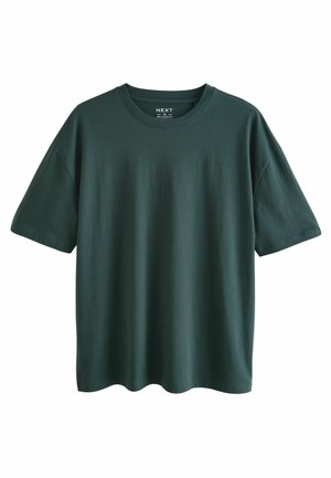 Camiseta de algodón de mangas cortas en verde oscuro, con cuello redondo y un corte relajado. Textura suave sin patrones visibles.
