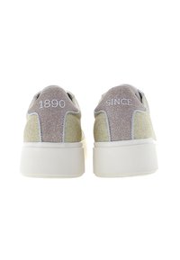 Glittery sneakers with a white midsole. Metallic silver and gold accents on heel. Features "1890" and "SINCE" in white text at the back.