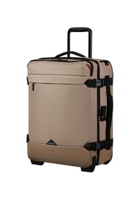 Beige Rollkoffer mit strukturierten Oberflächen, schwarzen Akzenten, ausziehbarem Griff, vorderer Reißverschlusstasche und robusten Rollen für Mobilität.