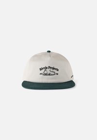 Čepice se světle béžovou korunou, tmavě zeleným kšiltem a centrálním logem s hadem a černým nápisem "Rivvia Projects est. '88".