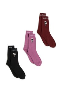 Tre paia di calzini: neri, rosa e borgogna. Ognuno ha una texture morbida e presenta un personaggio dei cartoni animati e il nome del marchio "KARLLA" sul bordo.