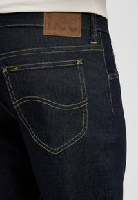 Lee RIDER - Slim fit jeans - rinse raine