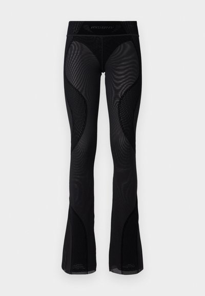 Svarte mesh flared tights med teksturdetaljer og mønstrede innsatser. Har høy midje med merkevarelogo øverst.