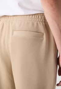 Lacoste Jogginghose - viennese