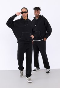 YOURTURN - SET UNISEX - Pantalon de survêtement - black Image miniature 1