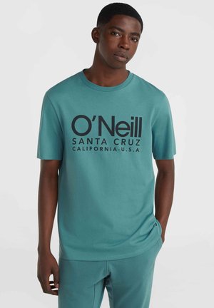 Teal cotton t-shirt with short sleeves, featuring large black text "O'Neill SANTA CRUZ CALIFORNIA U.S.A." on the front. Smooth texture, relaxed fit.