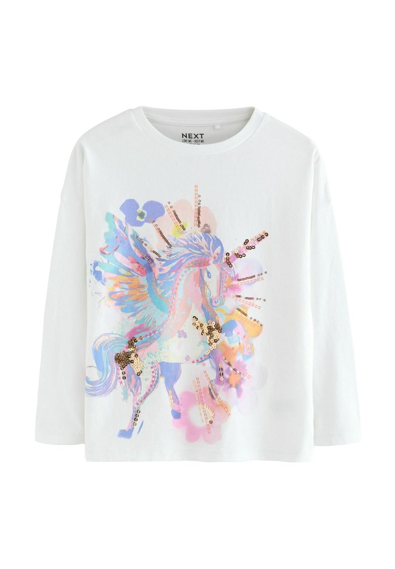 Camiseta blanca de algodón de manga larga con un gráfico de unicornio multicolor, adornado con lentejuelas y patrones de flores en tonos pastel.