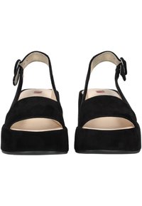 Sandali platform in suede nero con punta chiusa, lati aperti, cinturino regolabile alla caviglia e soletta interna liscia.