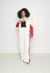 adidas Originals TRACK - Bluză de trening - white/vivid red
