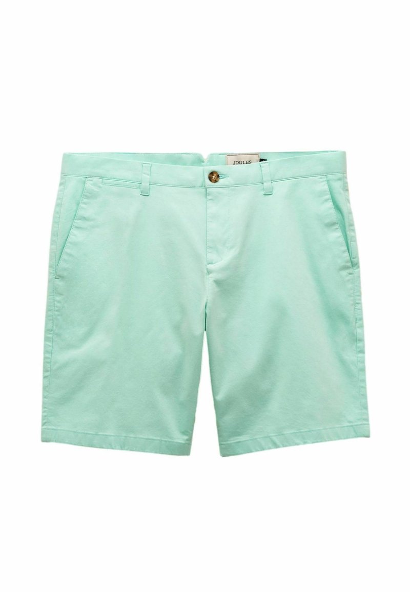 Gaiši piparmētru zaļi šorti, izgatavoti no kokvilnas, ar pogu aizdari, jostas cilpiņām un divām sānu kabatām. Gluda tekstūra, pielāgota piegrieze.