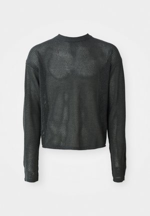 Pull en maille léger noir avec une coupe ample, doté d'un motif en maille, de manches longues et d'un col rond, apparaissant légèrement cropped.