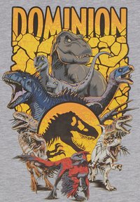 Das Grafik-T-Shirt zeigt mehrere Dinosaurier in Schwarz und Blau mit orangefarbenen Akzenten. Das Wort "DOMINION" ist auffällig oben platziert.