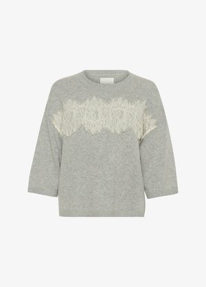 Hallide hall villane kampsun ümarate kaelustega, kolmveerandvarrukatega ja kreemja pitsiga paneeliga rinnaesisel. Pehme tekstuur ribide otstega.