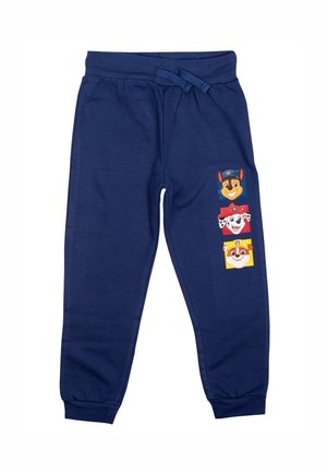 Pantaloni jogger blu navy in misto cotone con vita elastica e tre stampe di personaggi dei cartoni animati sulla coscia sinistra. Cavi alla caviglia.