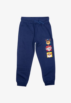 Marineblaue Jogginghose aus einem Baumwollmix mit einem elastischen Bund und drei Drucken von Cartoonfiguren auf dem linken Oberschenkel. Mit Bündchen an den Knöcheln.