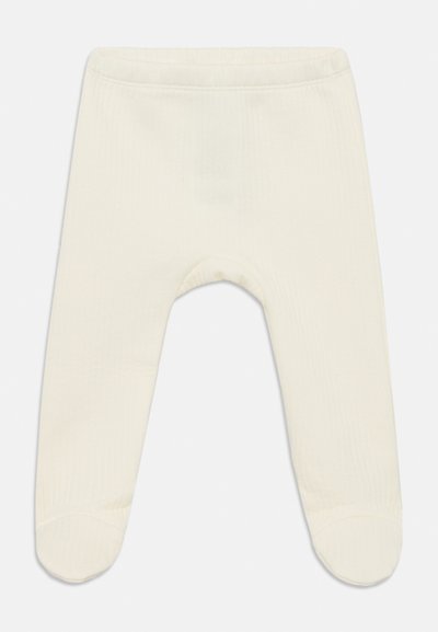 Kremfargede baby leggings laget av mykt ribbet stoff; har fotdesign og elastisk midjebånd for komfort.