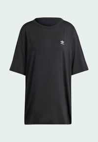 T-shirt nera a maniche corte realizzata in tessuto morbido con scollatura rotonda. Presenta un piccolo logo bianco Adidas sul petto sinistro.