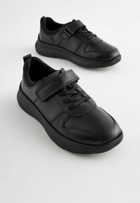 Zwarte synthetische sneakers met een ronde neus, veters en klittenbandsluiting, textuuraccenten en een gevoerde zool voor comfort.