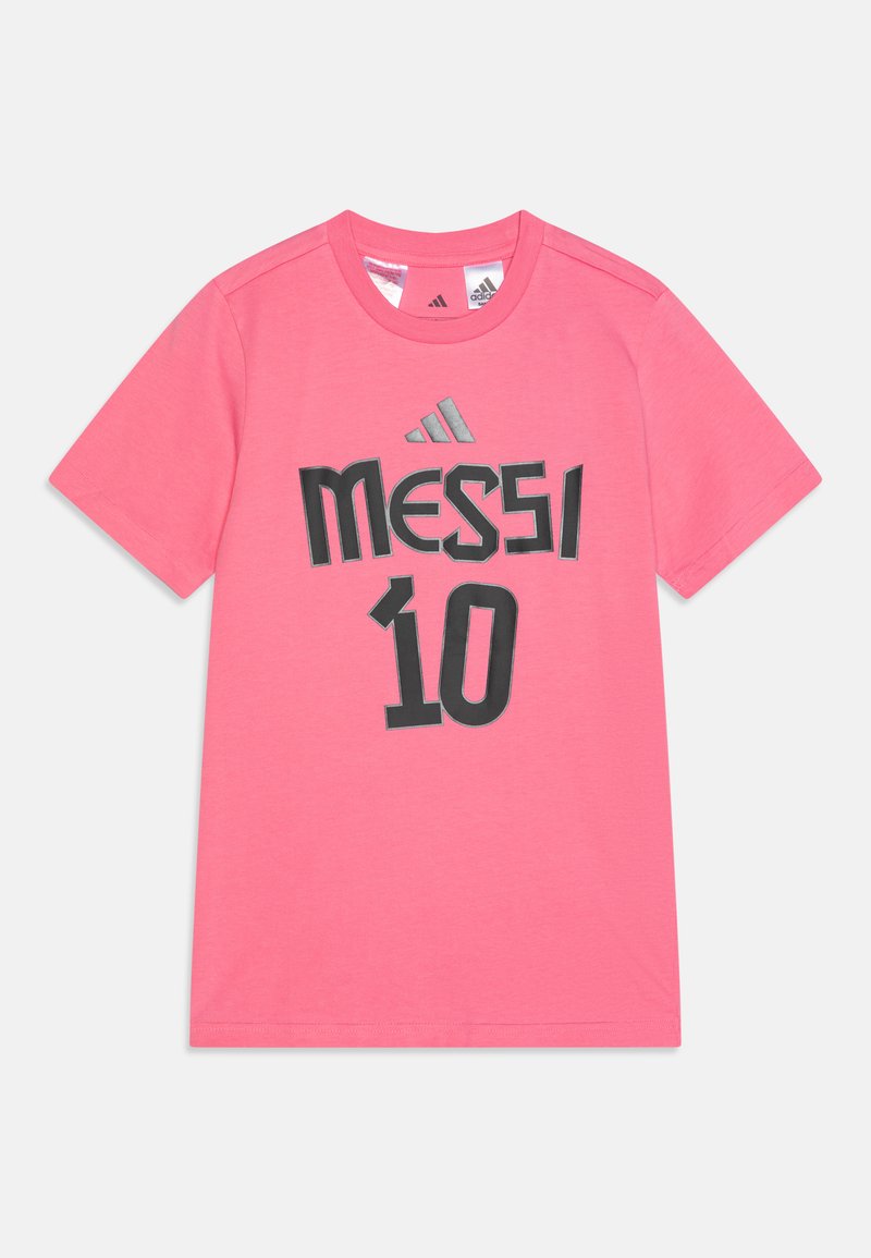 Rozā T-krekls ar īsām piedurknēm, uz kura ir uzraksts "MESSI" un skaitlis "10" treknā melnā burtā, izgatavots no gludas, elpojošas auduma.
