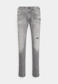 Grå denimjeans med slim fit, med slitna områden, fransade kanter och subtilt blekning. Klassisk femficksdesign och knappstängning.