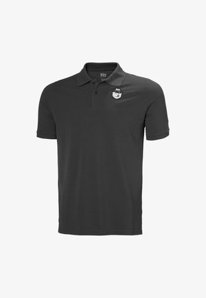 Polo negro de algodón con cuello camisero, que presenta un pequeño logo bordado en el pecho. Mangas cortas y corte clásico.