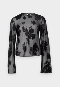 Svart gjennomsiktig bluse med lange ermer, blomsterdesign, rund hals og nøkkelhull-lukking bak. Myk, lett stoff med et gjennomsiktig utseende.
