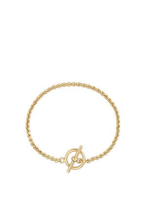 Gold chain bracelet with a round toggle clasp featuring a bar inserted through a circular loop closure.