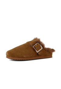 Brown suede slipper with a rounded toe, fur lining, adjustable buckle accent, and textured rubber sole for grip.