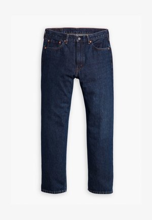 Tamno plave traperice ravnog kroja s pet džepova i narančastim šavovima, položene ravno na bijeloj pozadini.