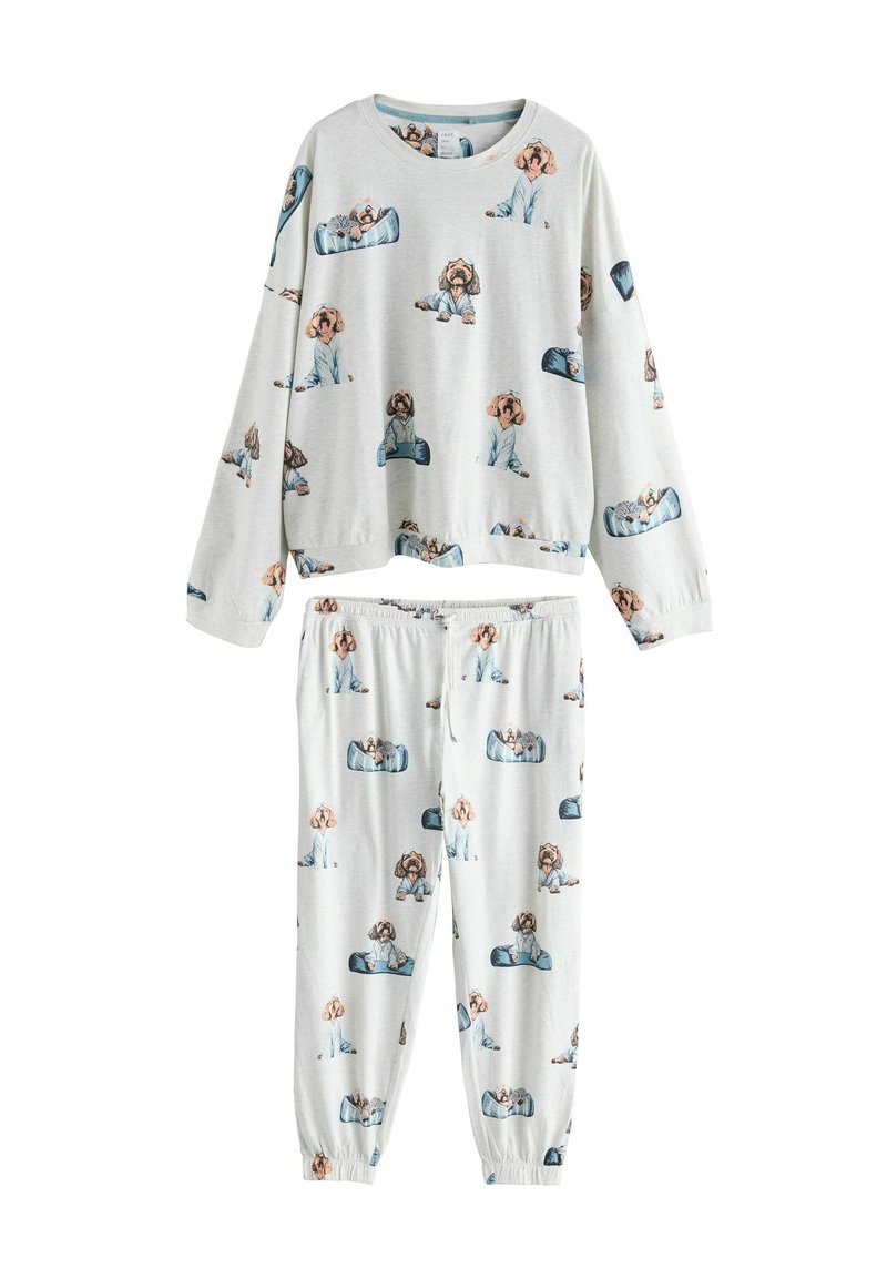Ljusgrå pyjamasset med långärmad topp och byxor med resår i midjan. Har upprepade illustrationer av hundar i blåa pyjamasar. Mjukt material.